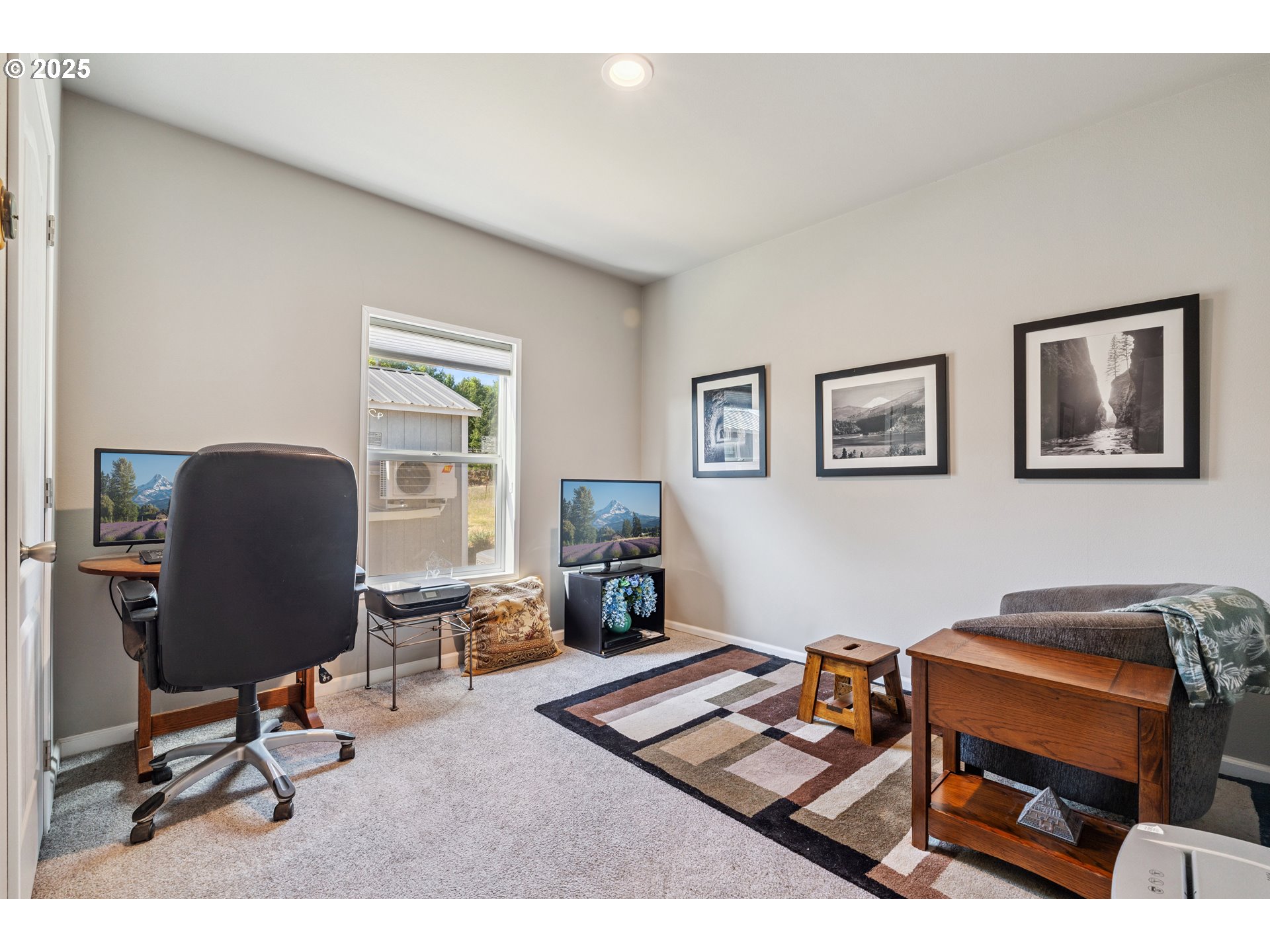 1682 Markham Road Hood River, OR 97031 - Photo 22 of 22 a view of a workspace with furniture and a window