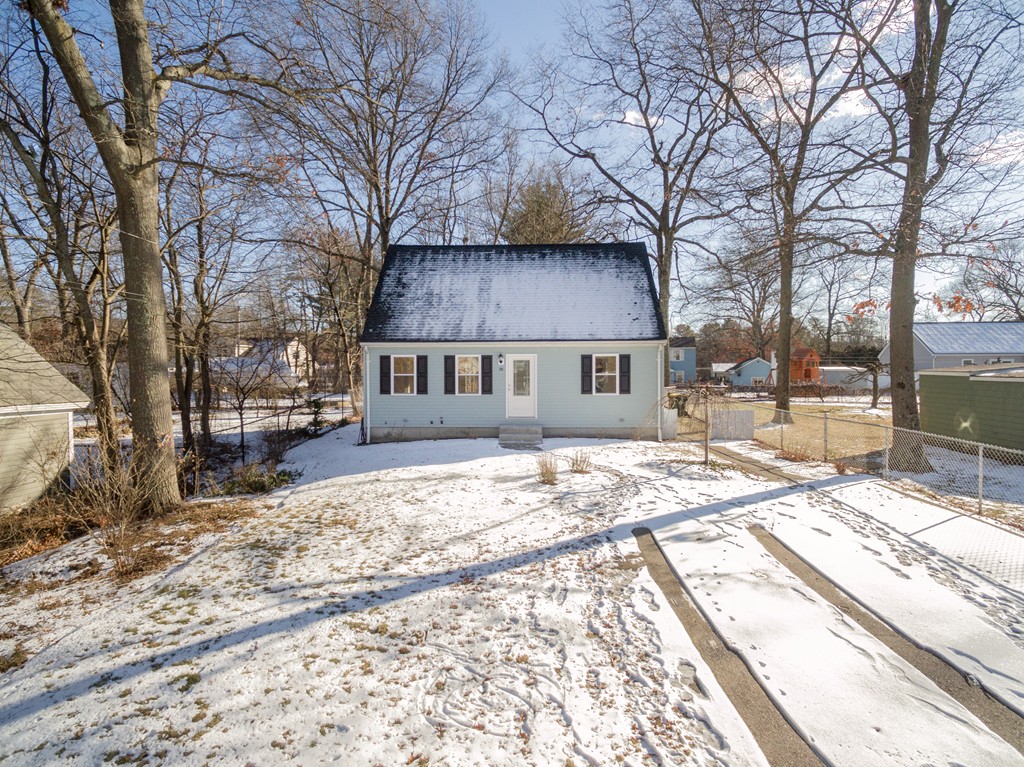 a house with trees in front of it
