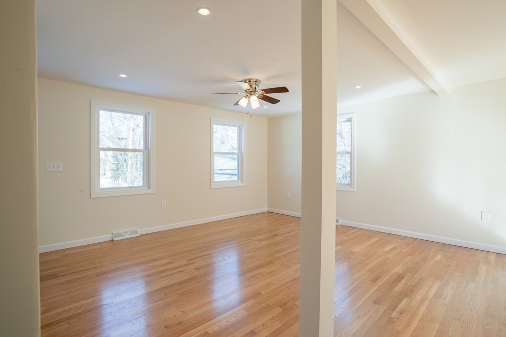98 Indian Run Road Bellingham, MA 02019 - Photo 14 of 30 wooden floor in an empty room with a window