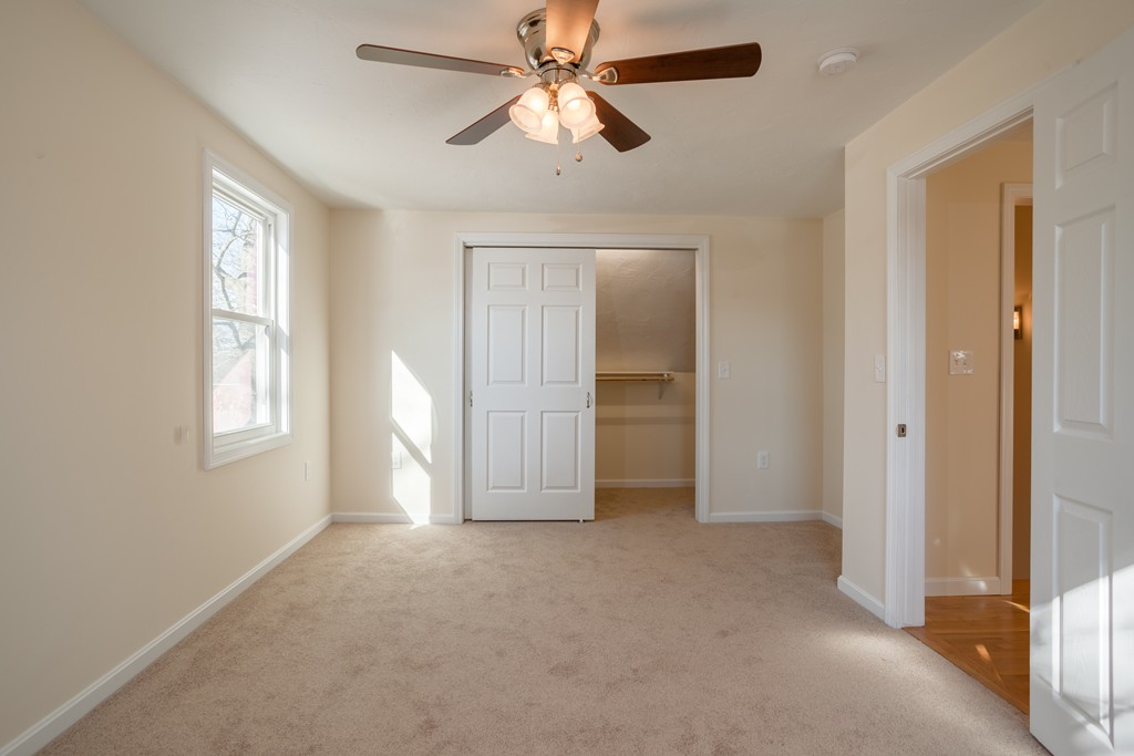 98 Indian Run Road Bellingham, MA 02019 - Photo 15 of 30 a view of empty room with window and ceiling fan