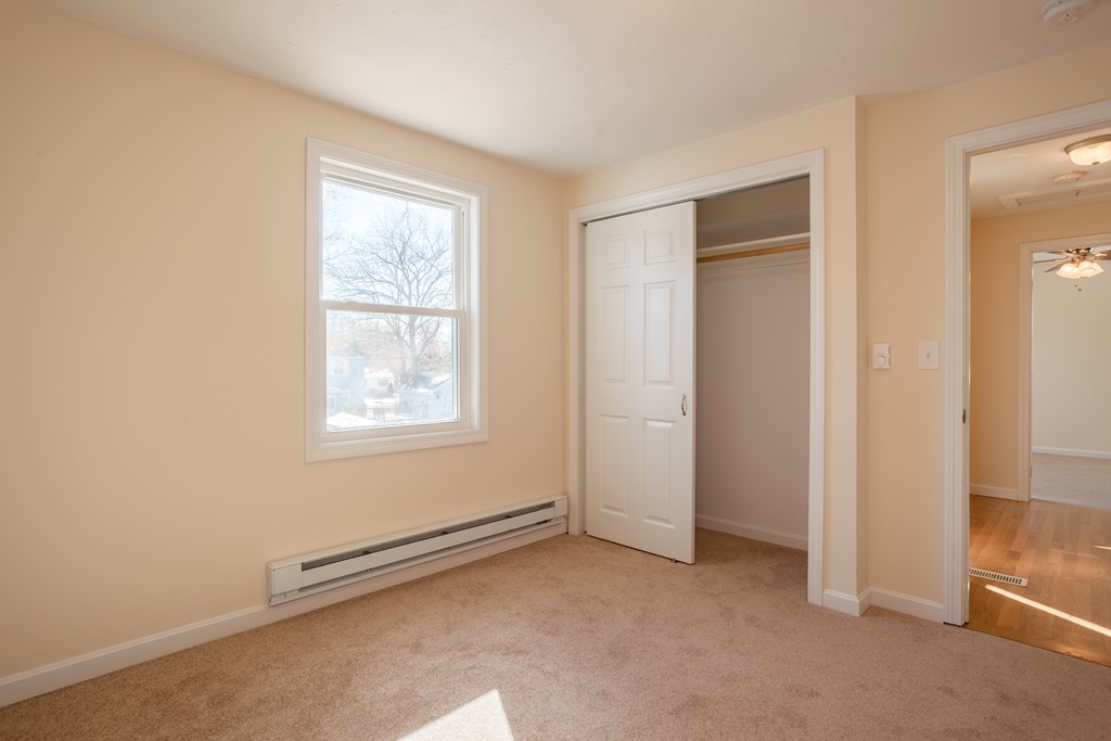 98 Indian Run Road Bellingham, MA 02019 - Photo 19 of 30 an empty room with windows