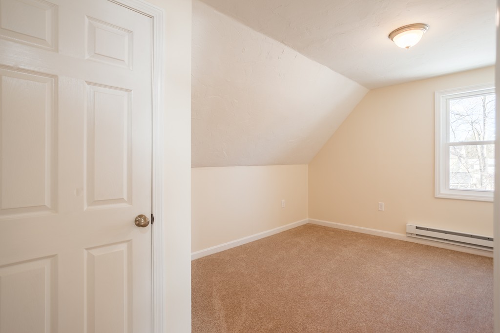 98 Indian Run Road Bellingham, MA 02019 - Photo 23 of 30 an empty room with windows
