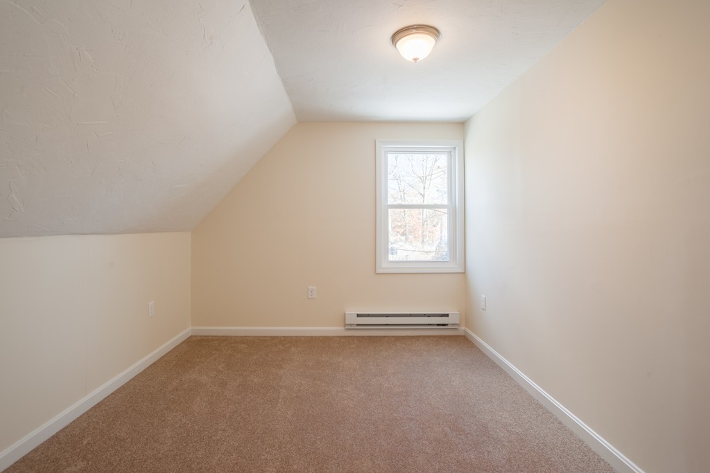 98 Indian Run Road Bellingham, MA 02019 - Photo 24 of 30 an empty room with a window