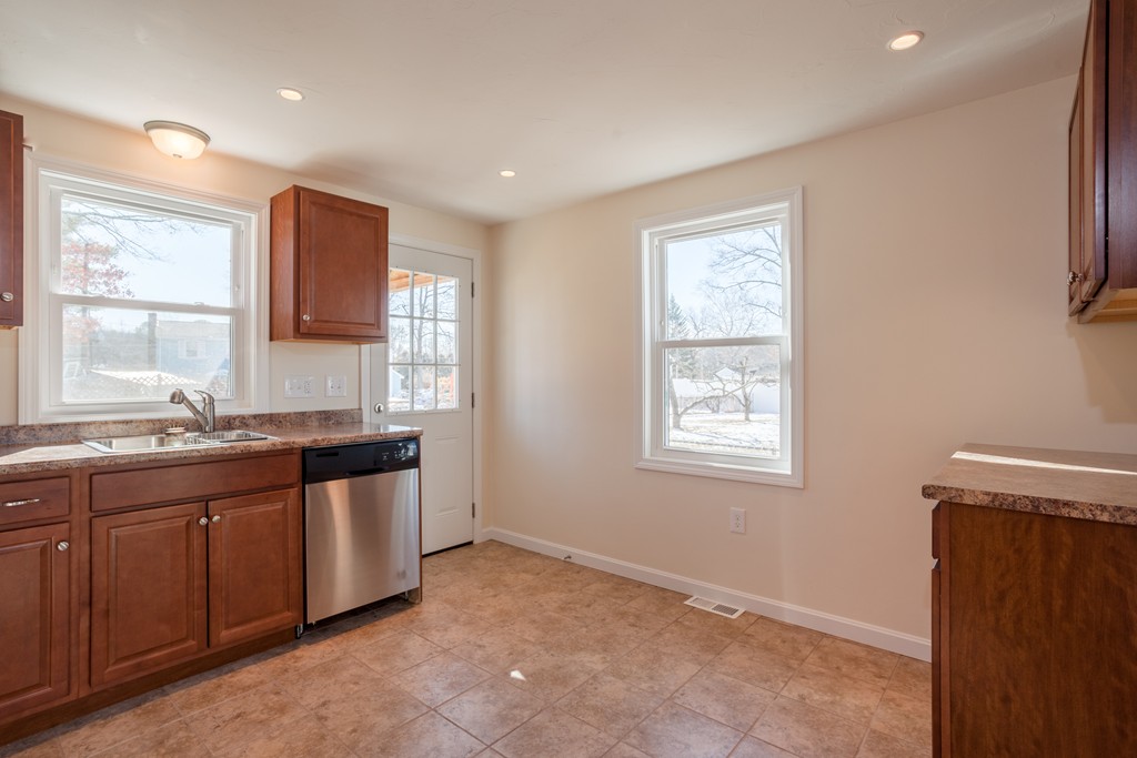 98 Indian Run Road Bellingham, MA 02019 - Photo 7 of 30 a large bathroom with double vanity and a window