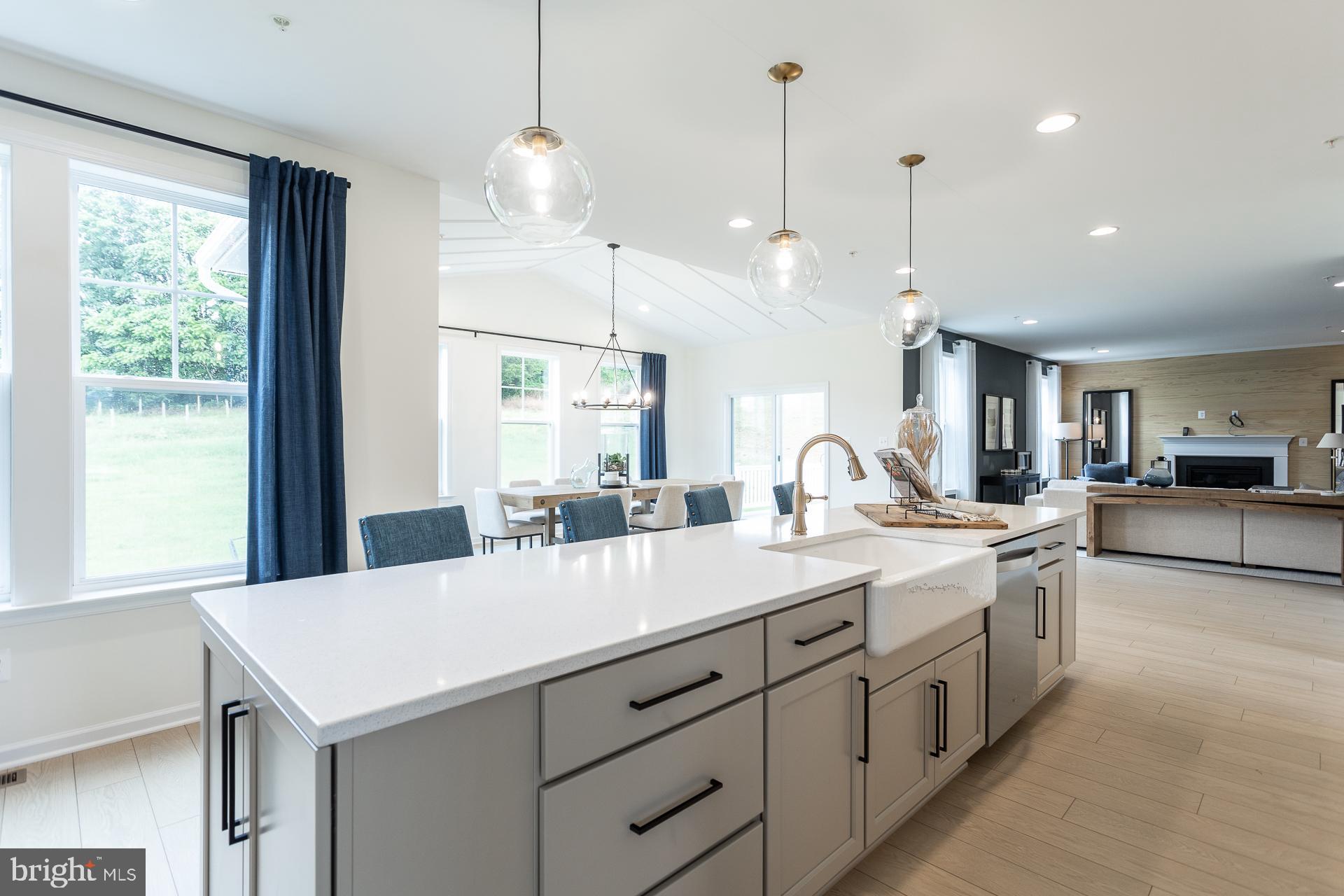 669 Burnlea Road Charles Town, WV 25414 - Photo 5 of 48 a large kitchen with kitchen island a sink appliances and a large window