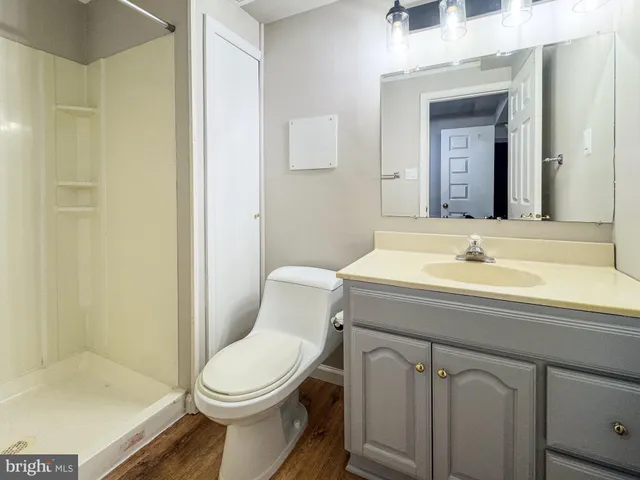 a view of a house with wooden deck