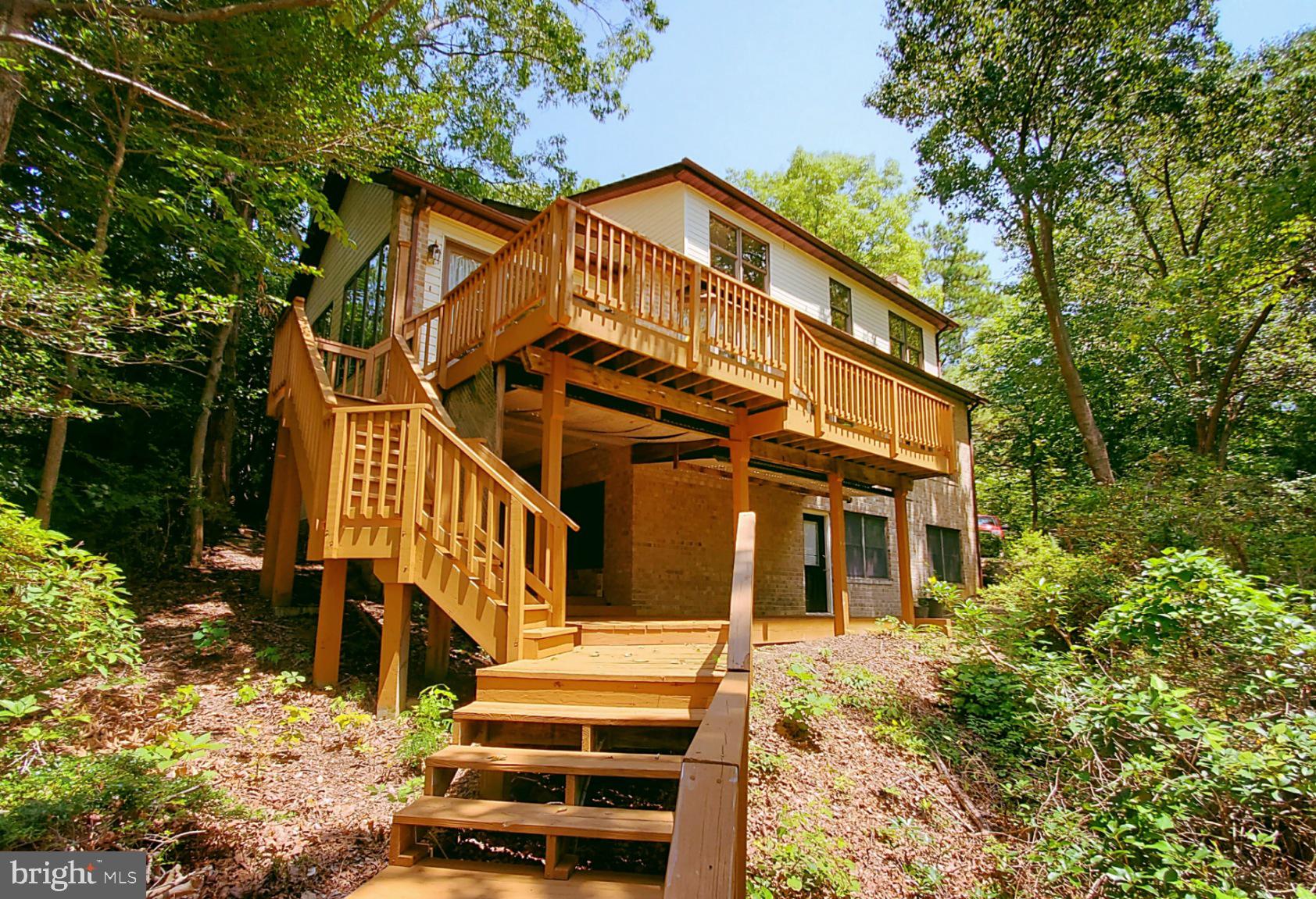 12555 Rousby Hall Road Lusby, MD 20657 - Photo 1 of 18 Fresh Stain on the Lovely back deck