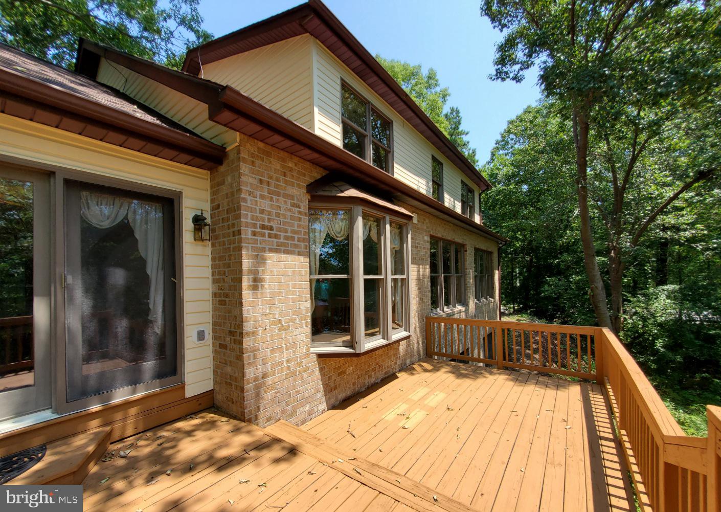 12555 Rousby Hall Road Lusby, MD 20657 - Photo 16 of 18 Lovely back deck