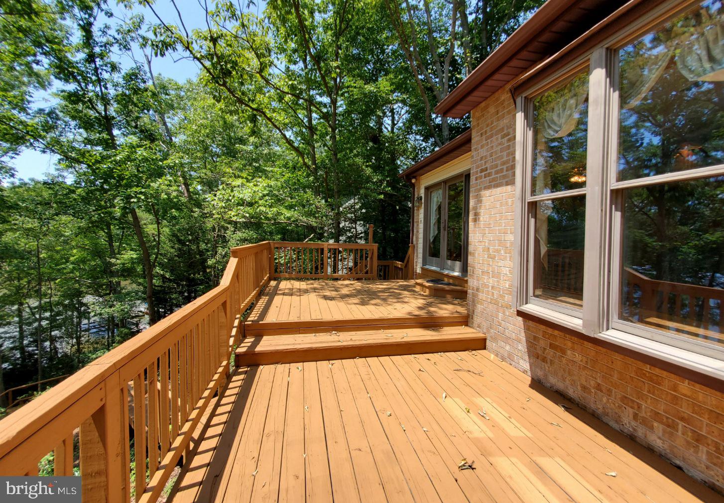 12555 Rousby Hall Road Lusby, MD 20657 - Photo 17 of 18 Lovely back deck