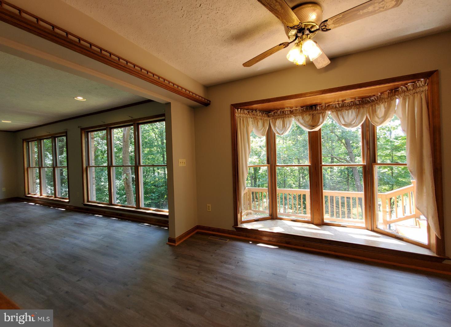 12555 Rousby Hall Road Lusby, MD 20657 - Photo 3 of 18 Dining area overlooking water