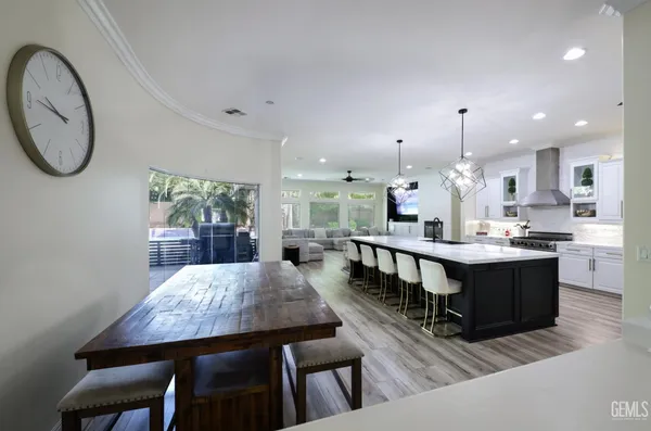 a view of hallway with wooden floor