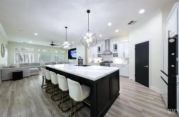 a bathroom with a shower a toilet and a tub
