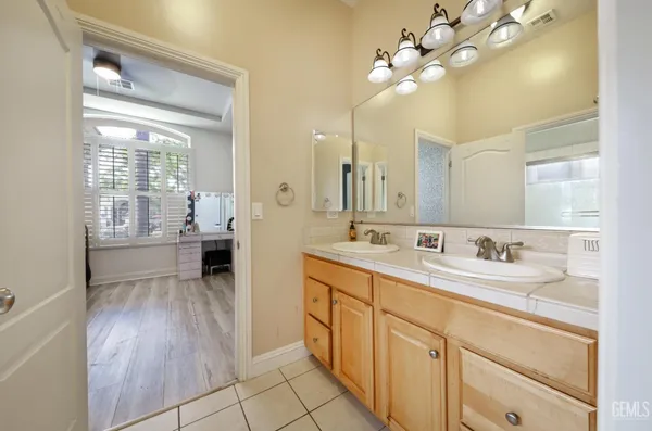 a bathroom with a bathtub and shower