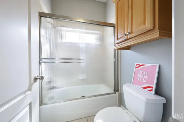 a swimming pool with outdoor seating and yard