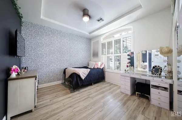 a view of a swimming pool with a yard