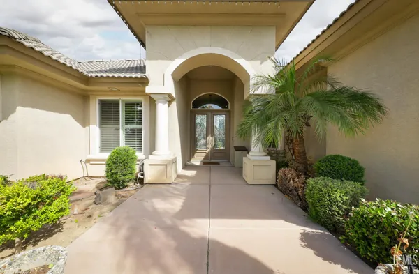 a view of house with a garden