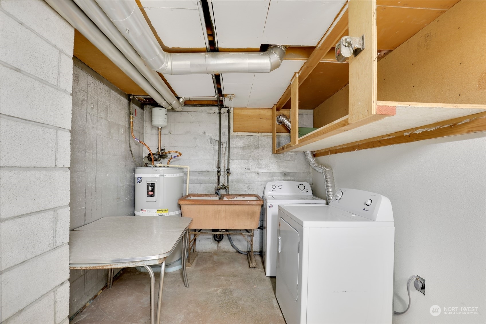 1608 Shattuck Avenue South Renton, WA 98055 - Photo 24 of 38 a utility room with dryer and washer
