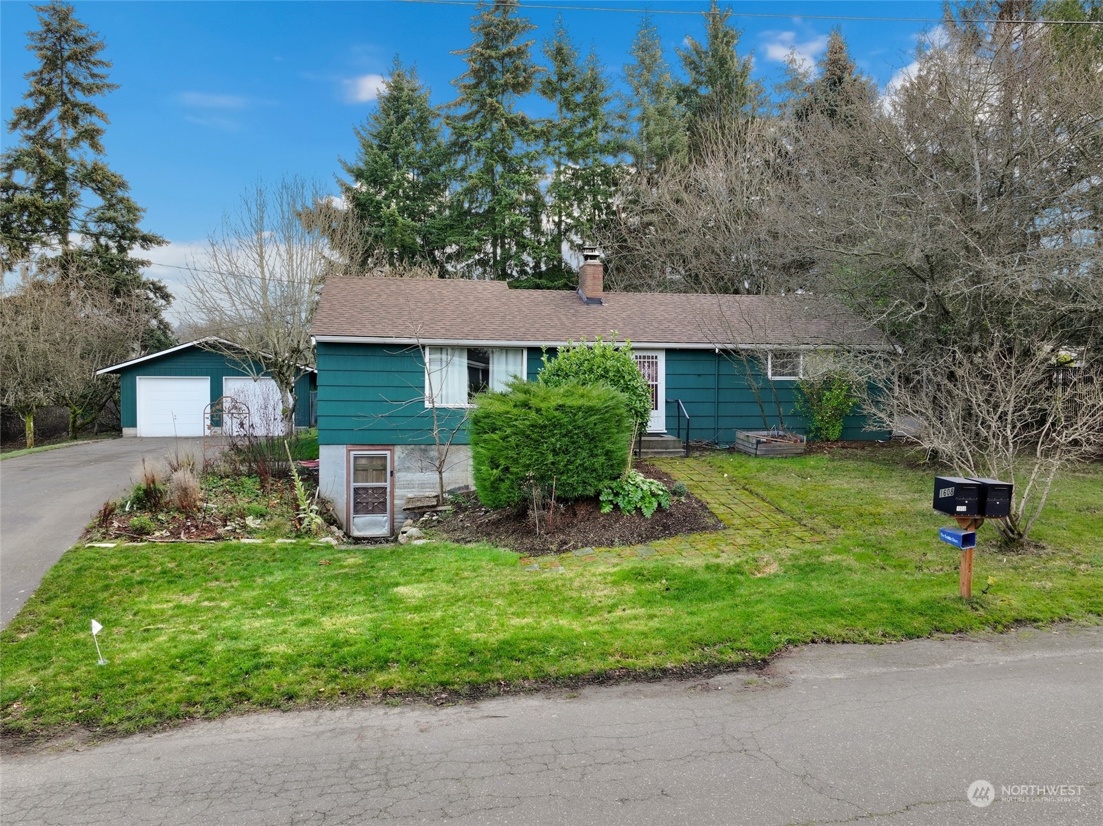 1608 Shattuck Avenue South Renton, WA 98055 - Photo 32 of 38 a front view of a house with a yard
