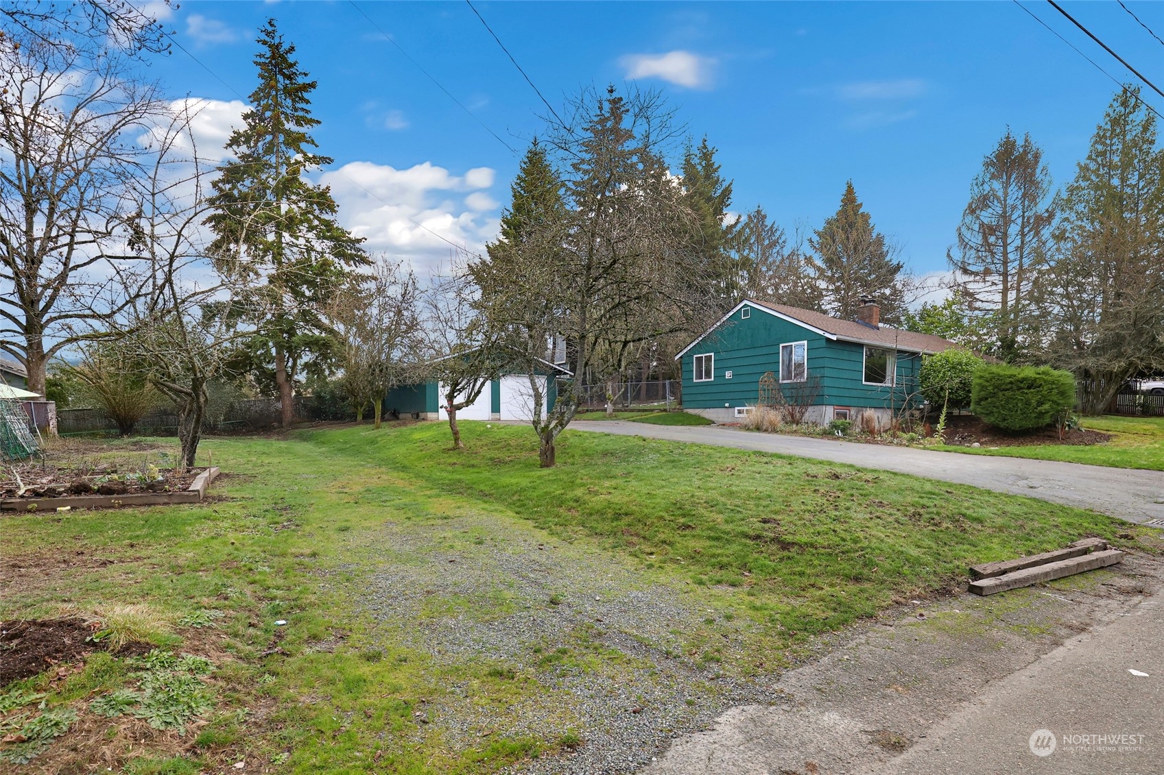 1608 Shattuck Avenue South Renton, WA 98055 - Photo 34 of 38 a front view of house with yard and green space