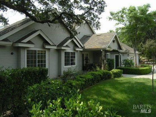 6958 Oak Tree Trail Vacaville, CA 95688 - Photo 14 of 22 a front view of a house with garden