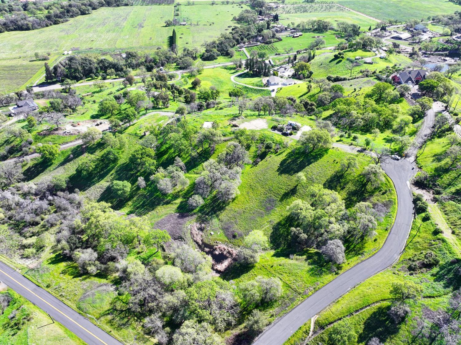 6958 Oak Tree Trail Vacaville, CA 95688 - Photo 2 of 22 a view of a garden with a tree