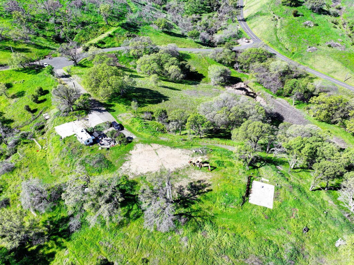 6958 Oak Tree Trail Vacaville, CA 95688 - Photo 3 of 22 a view of a garden with a flower
