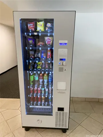 a view of swimming pool with outdoor seating and city view