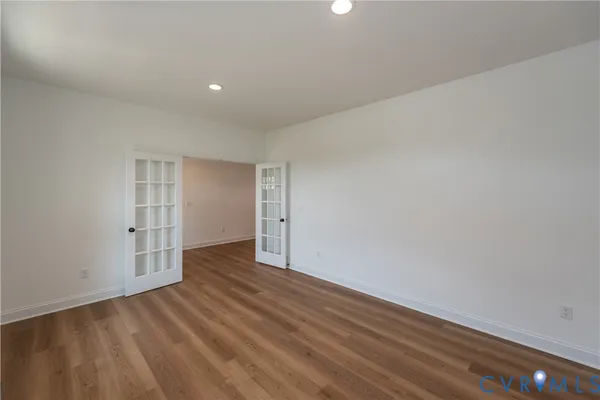a kitchen with a refrigerator and window