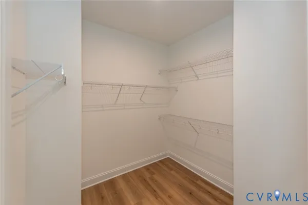 a bathroom with a double vanity sink and mirror