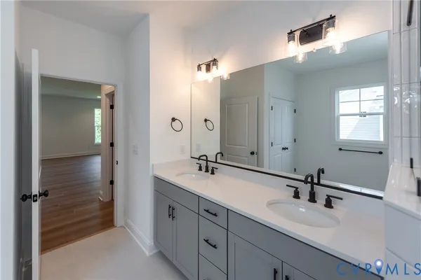 a stove top oven sitting inside of a kitchen