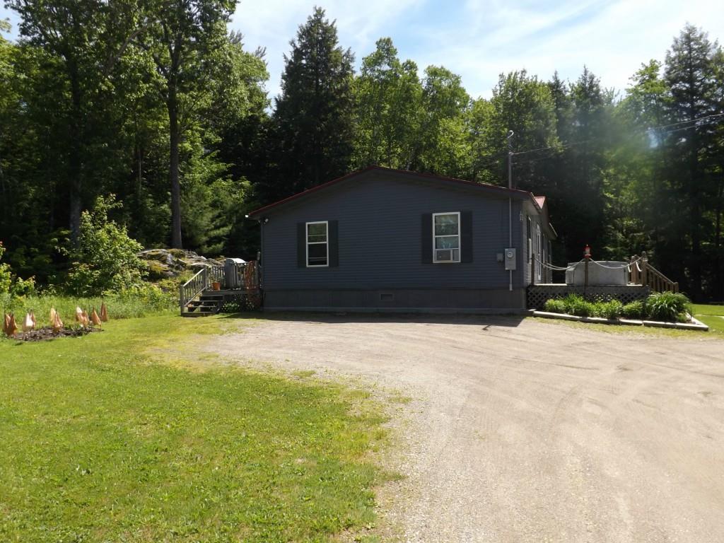 162 Higgins Hill Road Morrill, ME 04952 - Photo 4 of 23 Side view from driveway/parking area.