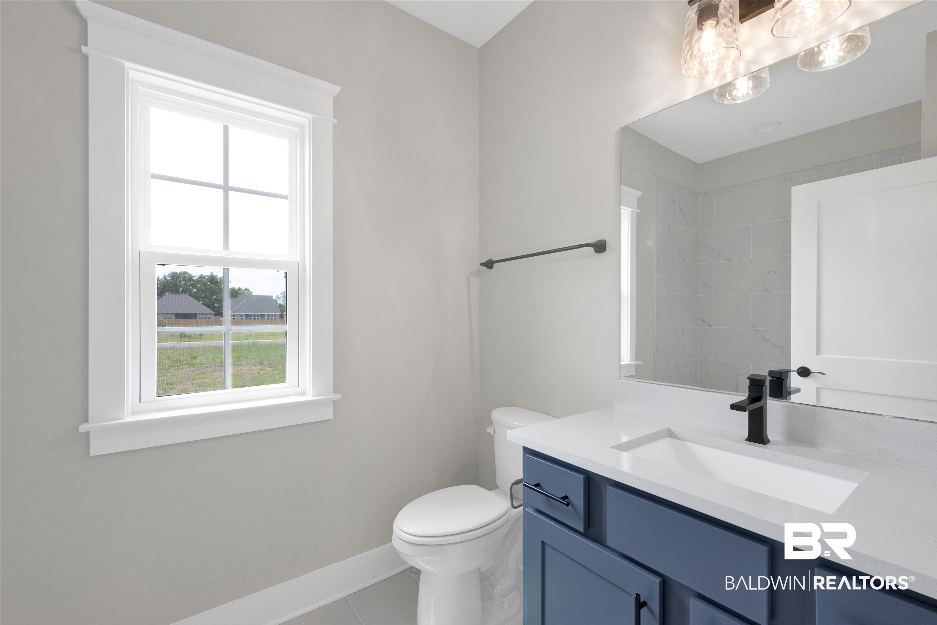 27315 Patch Pl Loop Daphne, AL 36526 - Photo 21 of 43 Bathroom featuring vanity, tile patterned flooring, and a shower