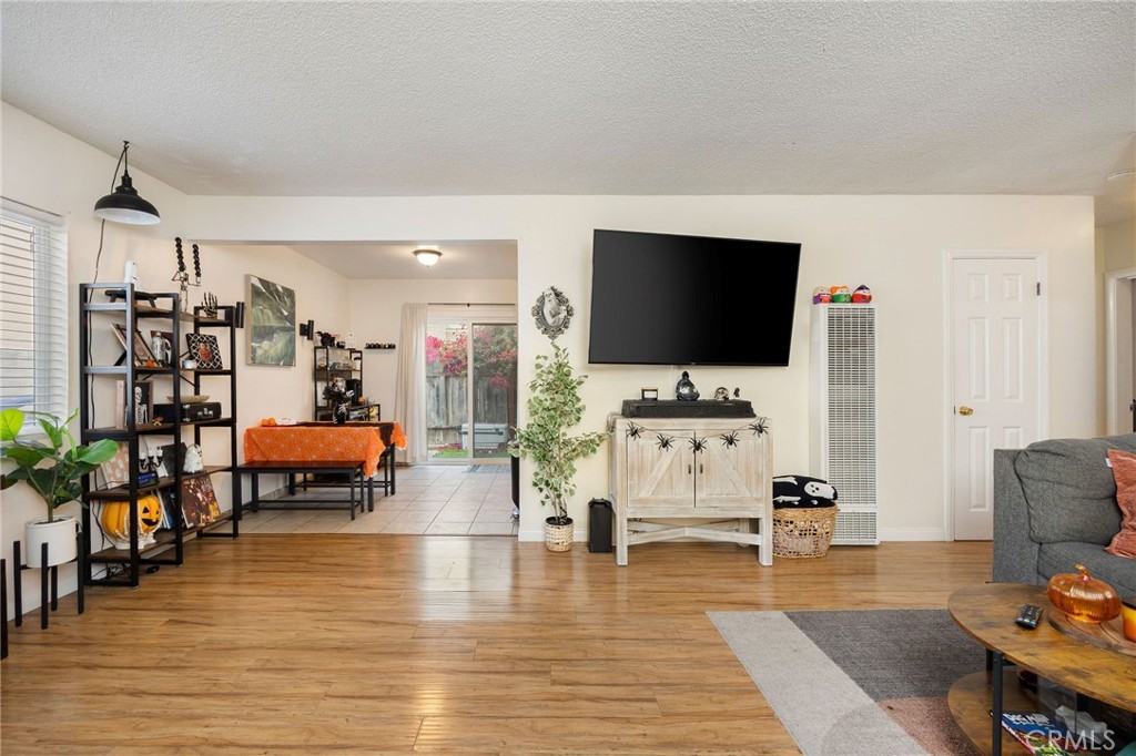 2615 Rockefeller Lane Redondo Beach, CA 90278 - Photo 17 of 33 a living room with furniture and a flat screen tv