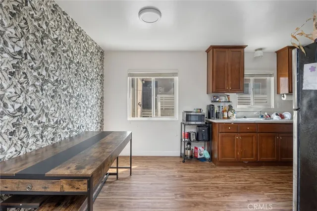 a view of a kitchen with furniture and window