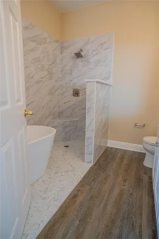 a bathroom with a sink a mirror and a window