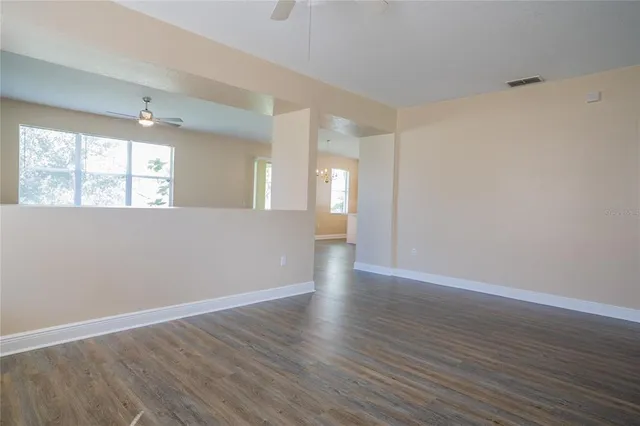 a view of a swimming pool with a lounge chair