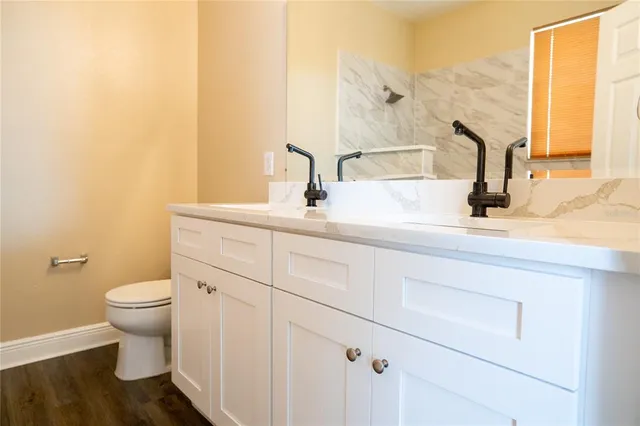 a bathroom with a sink and a toilet