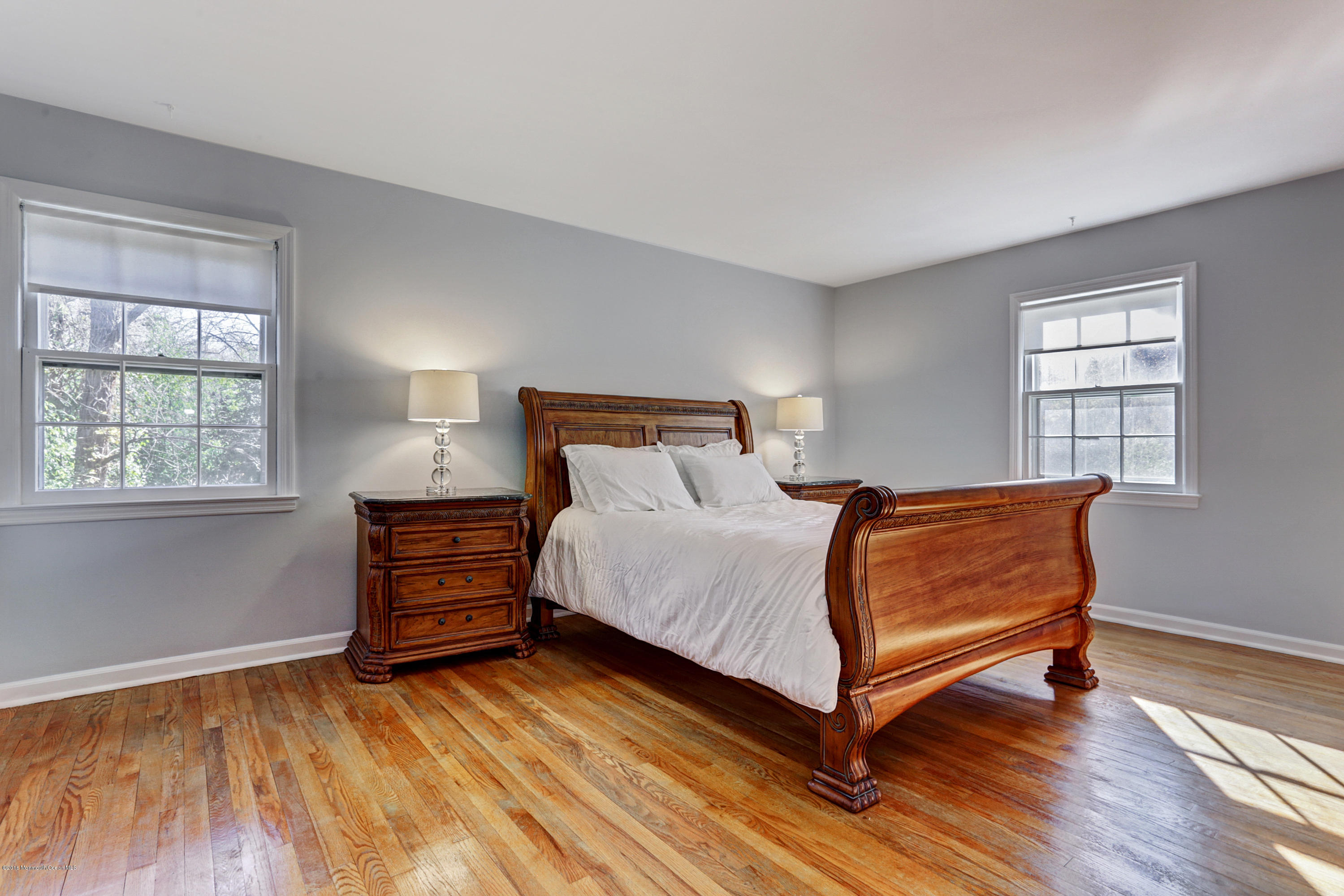 254 Newman Springs Road Colts Neck, NJ 07722 - Photo 15 of 30 a bedroom with a bed and window