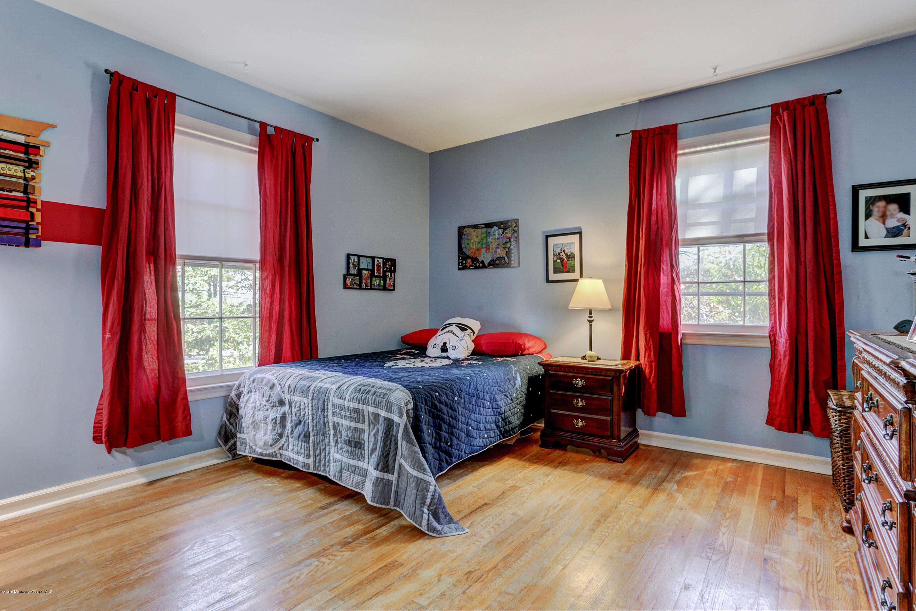 254 Newman Springs Road Colts Neck, NJ 07722 - Photo 18 of 30 a living room with a bed and a window