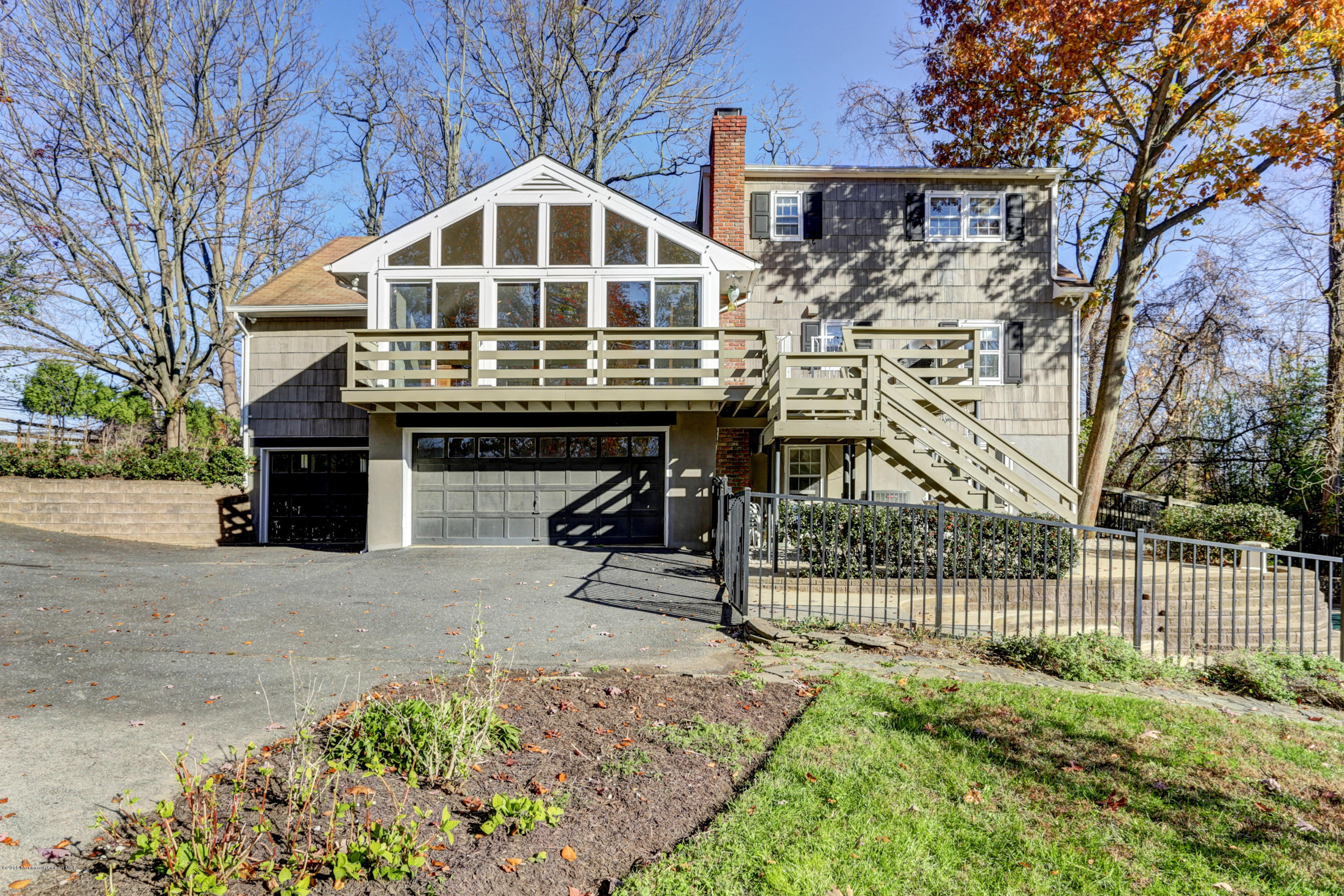 254 Newman Springs Road Colts Neck, NJ 07722 - Photo 29 of 30 a front view of a house with a yard