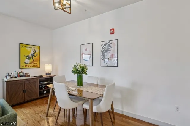 a bedroom with a bed and a mirror