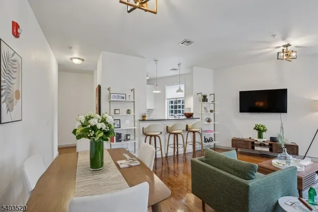 a kitchen with a sink and a stove top oven