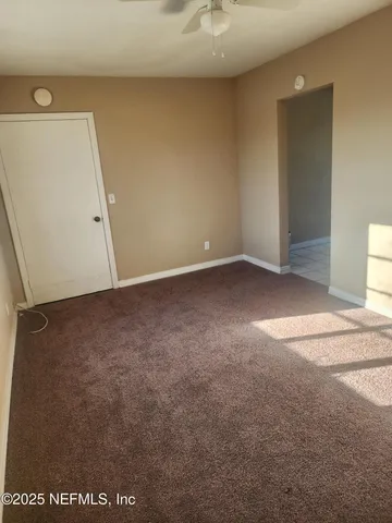 an empty room with an entryway
