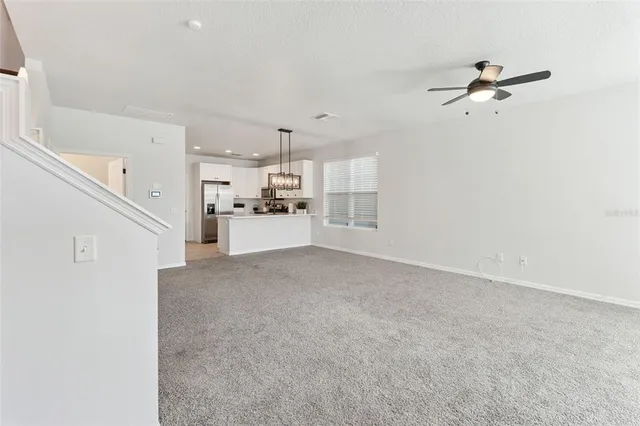 a view of a kitchen with a sink