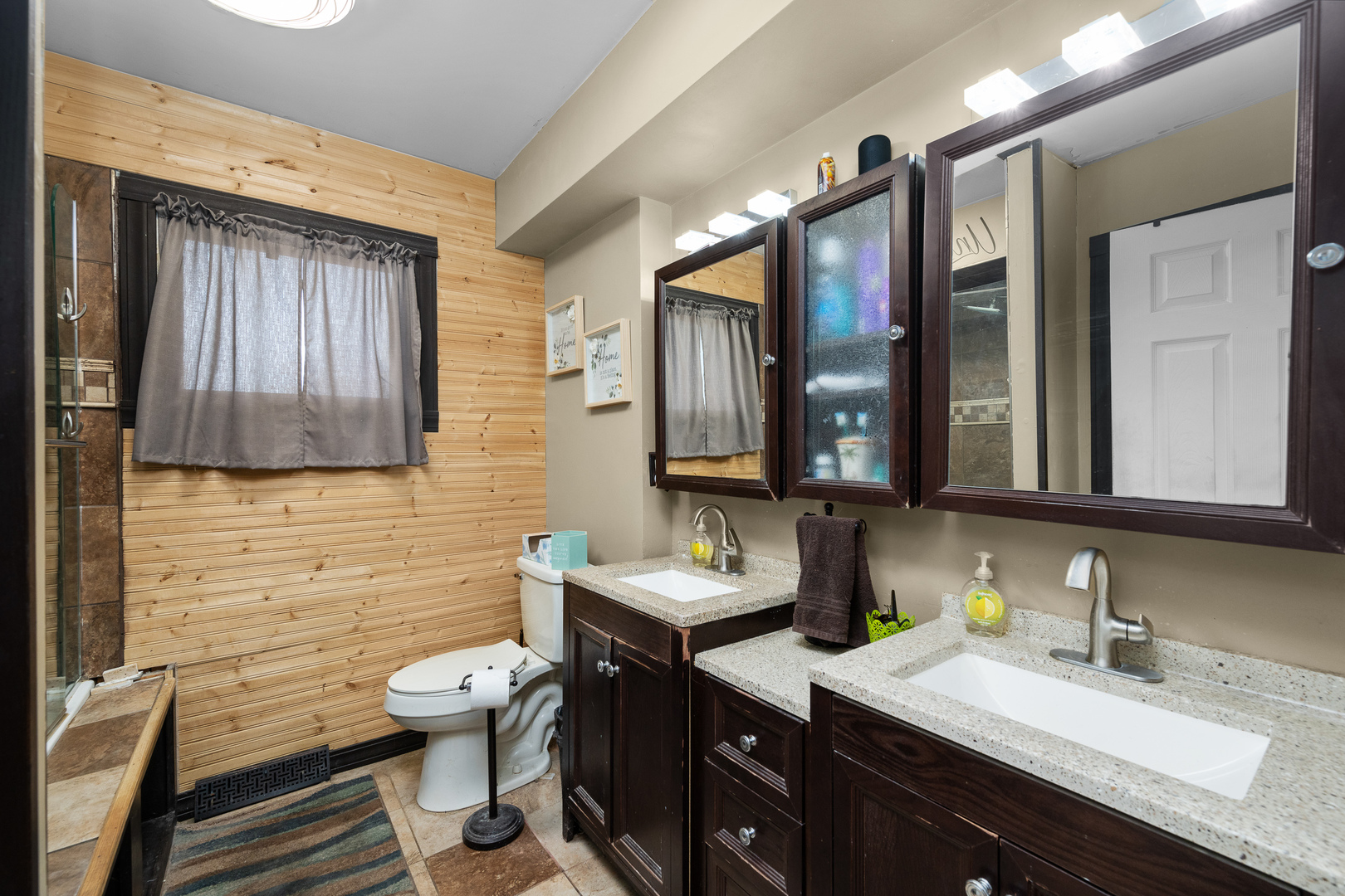 3604 32nd Avenue Moline, IL 61265 - Photo 15 of 36 a bathroom with a granite countertop sink vanity mirror and toilet