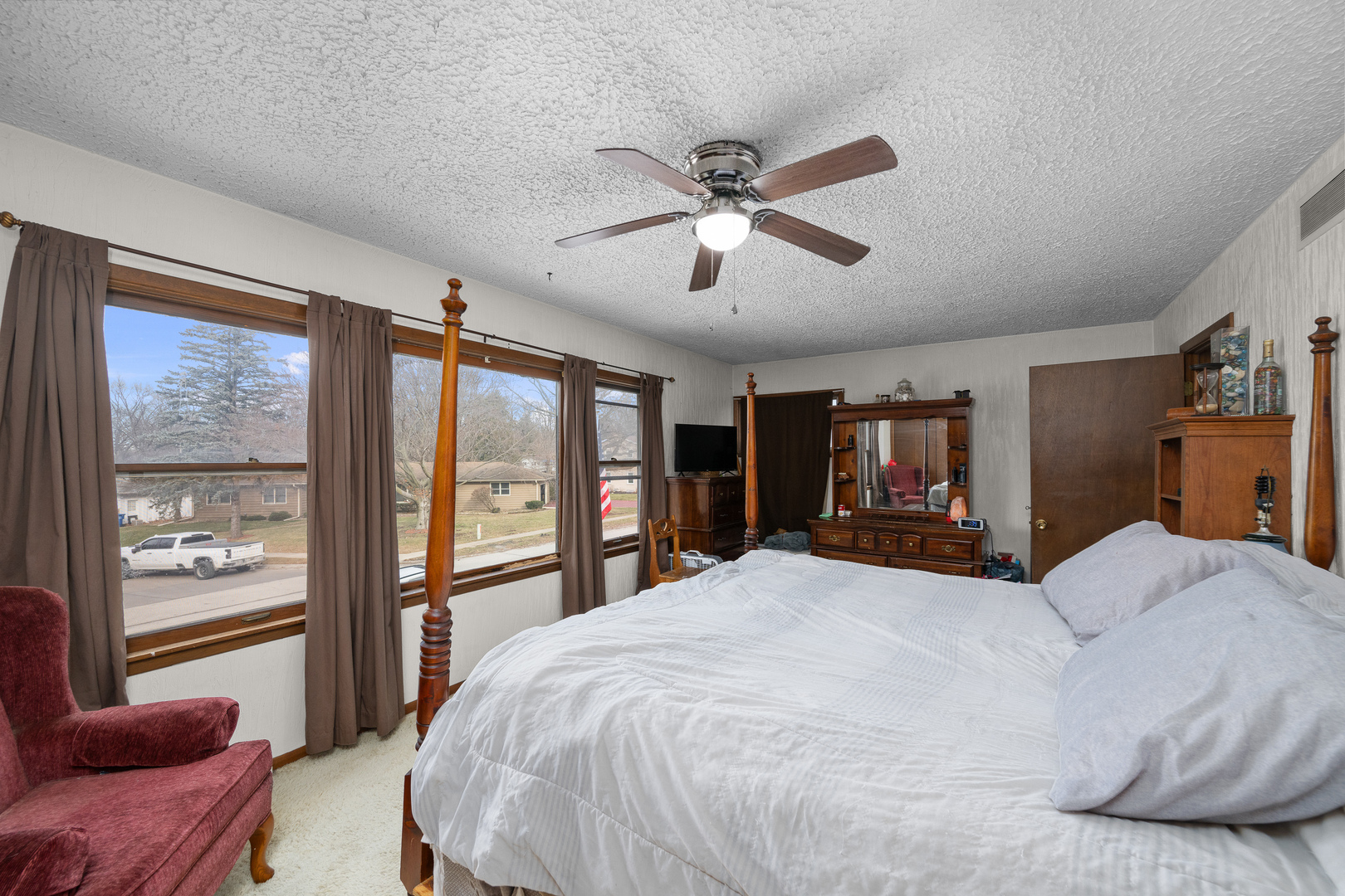 3604 32nd Avenue Moline, IL 61265 - Photo 18 of 36 a bedroom with a large bed and a large window