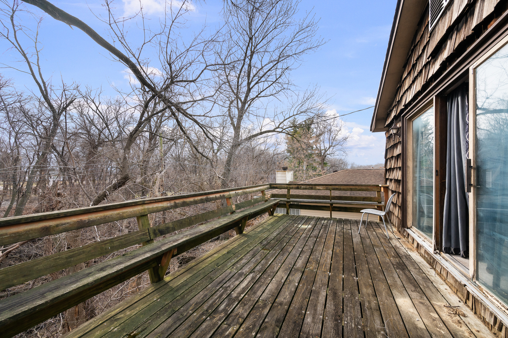 3604 32nd Avenue Moline, IL 61265 - Photo 31 of 36 a view of backyard with wooden floor and outdoor seating