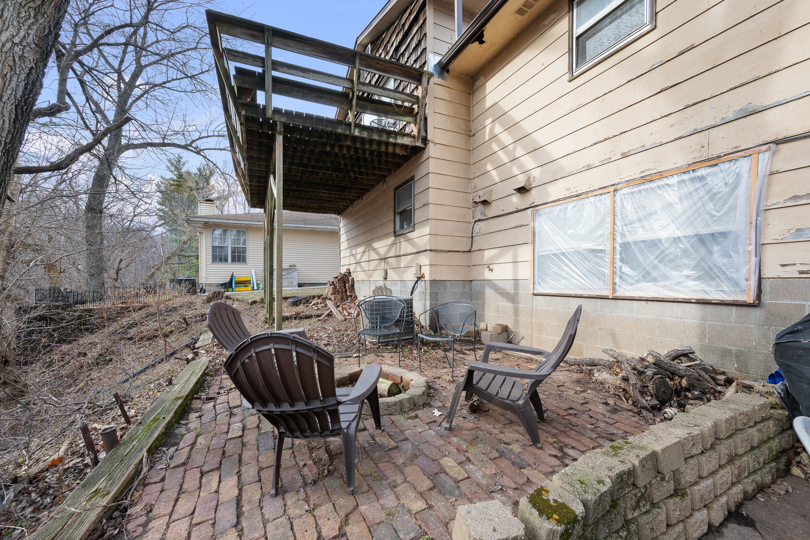 3604 32nd Avenue Moline, IL 61265 - Photo 34 of 36 a view of a chairs and table in the patio