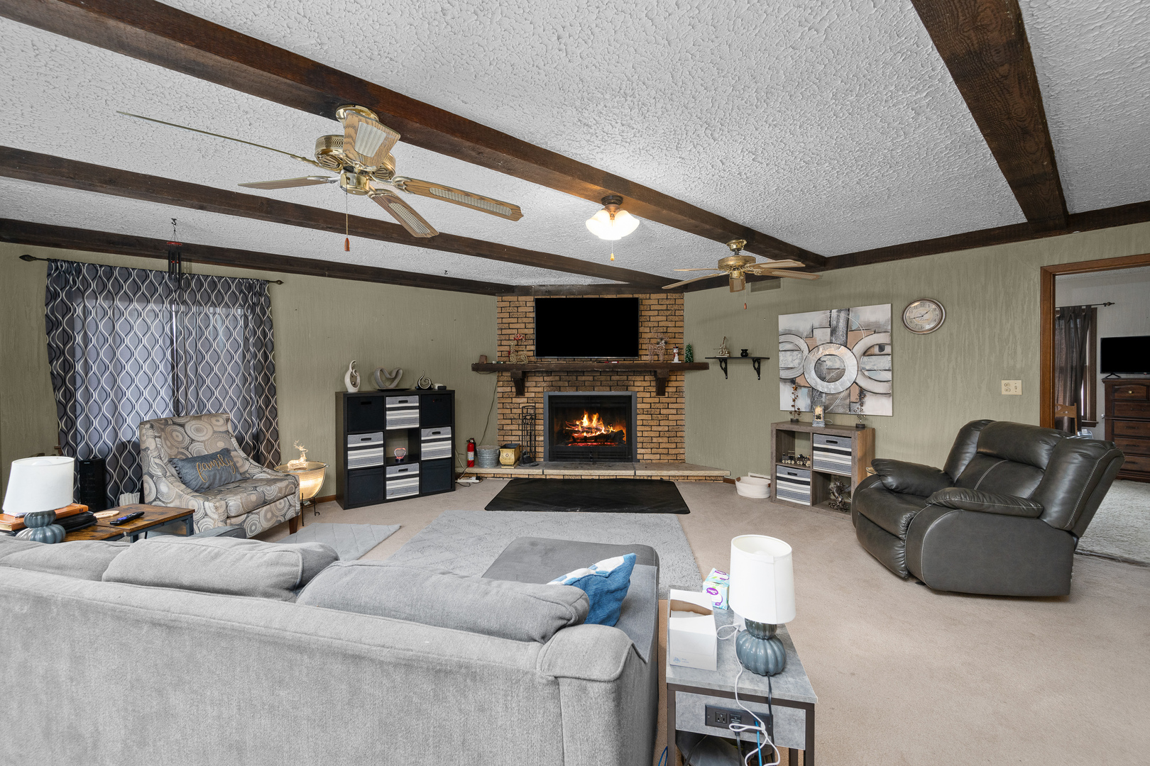 3604 32nd Avenue Moline, IL 61265 - Photo 5 of 36 a living room with furniture and a fireplace