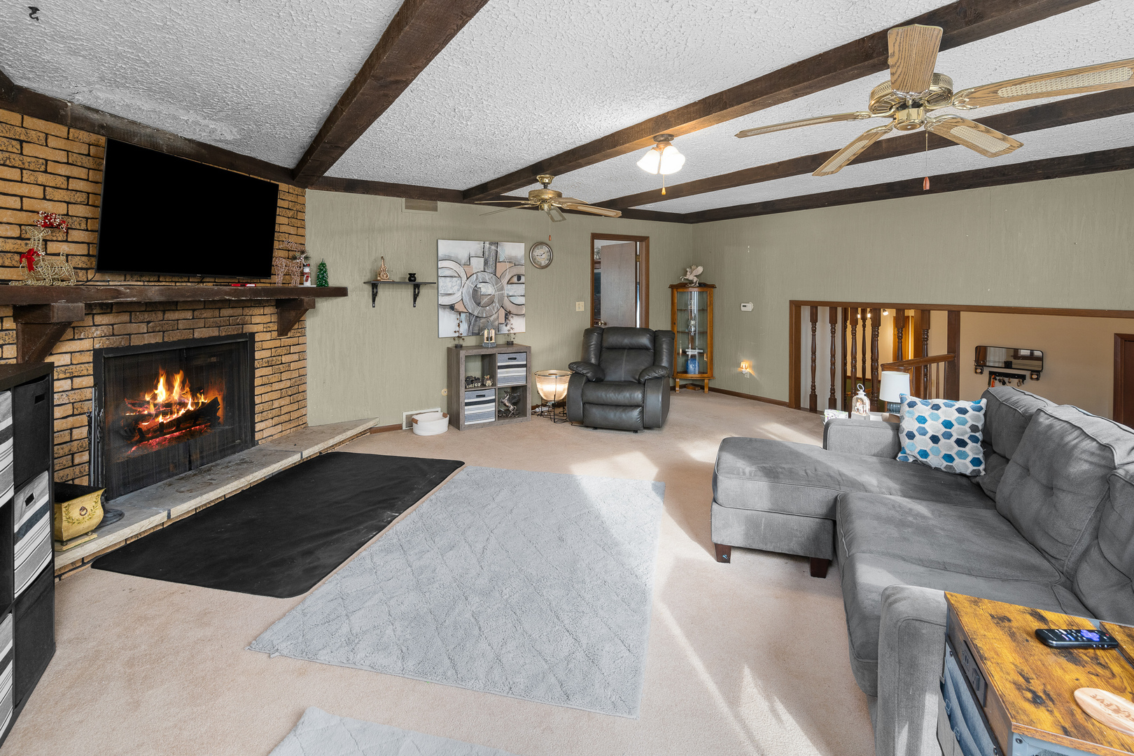 3604 32nd Avenue Moline, IL 61265 - Photo 6 of 36 a living room with furniture and a fireplace